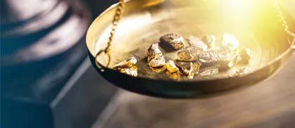 Oro al minimo di 14 settimane per il dollaro più forte: cosa succederà?